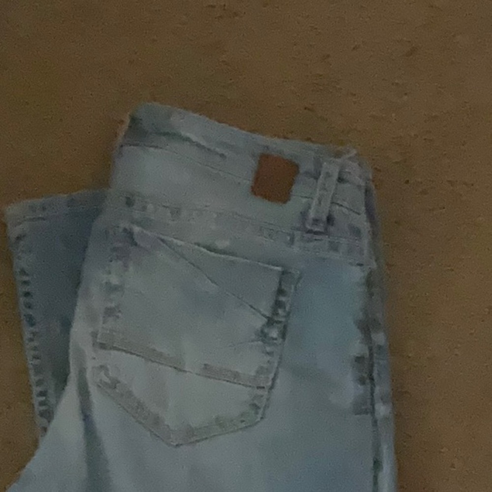 Classic Blue Denim Jeans with Distressed Details